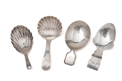 Lot 490 - Four silver tea caddy spoons