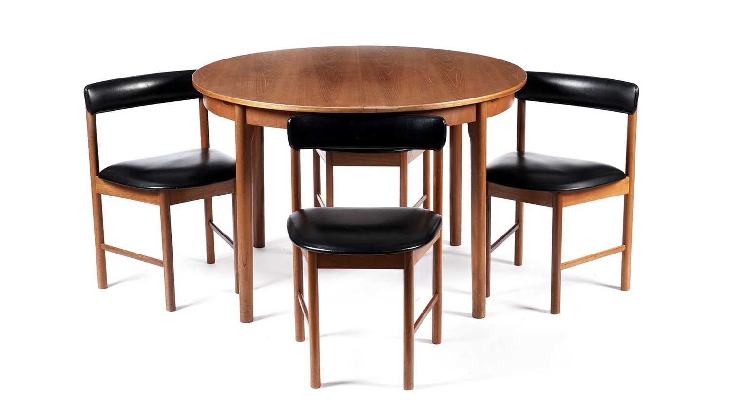 Lot 65 - McIntosh of Kirkaldy: A retro teak extending dining table and chairs