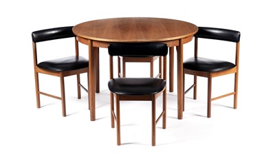 Lot 65 - McIntosh of Kirkaldy: A retro teak extending dining table and chairs