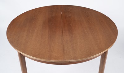 Lot 65 - McIntosh of Kirkaldy: A retro teak extending dining table and chairs