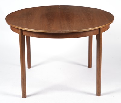 Lot 65 - McIntosh of Kirkaldy: A retro teak extending dining table and chairs