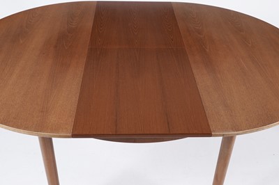 Lot 65 - McIntosh of Kirkaldy: A retro teak extending dining table and chairs