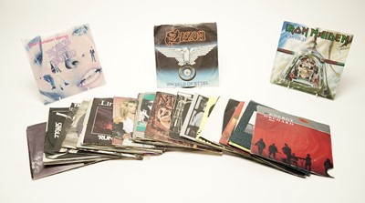 Lot 135 - A collection of rock 7" singles
