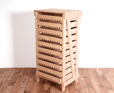 Lot 25 - A modern hardwood apple store/storage unit