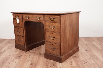 Lot 58 - A reproduction mahogany desk
