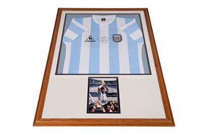 Lot 745 - An Argentina World Cup replica football shirt signed by Maradona