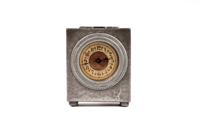 Lot 190 - An English Pewter miniature pewter mantle clock by Liberty & Co
