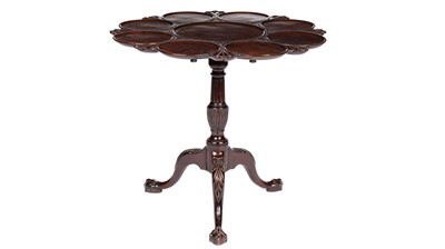 Lot 995 - A Georgian mahogany tilt action supper table