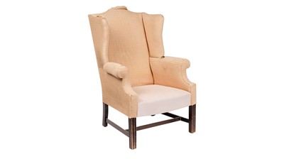 Lot 1006 - A Georgian style  wingback armchair, 19th Century.