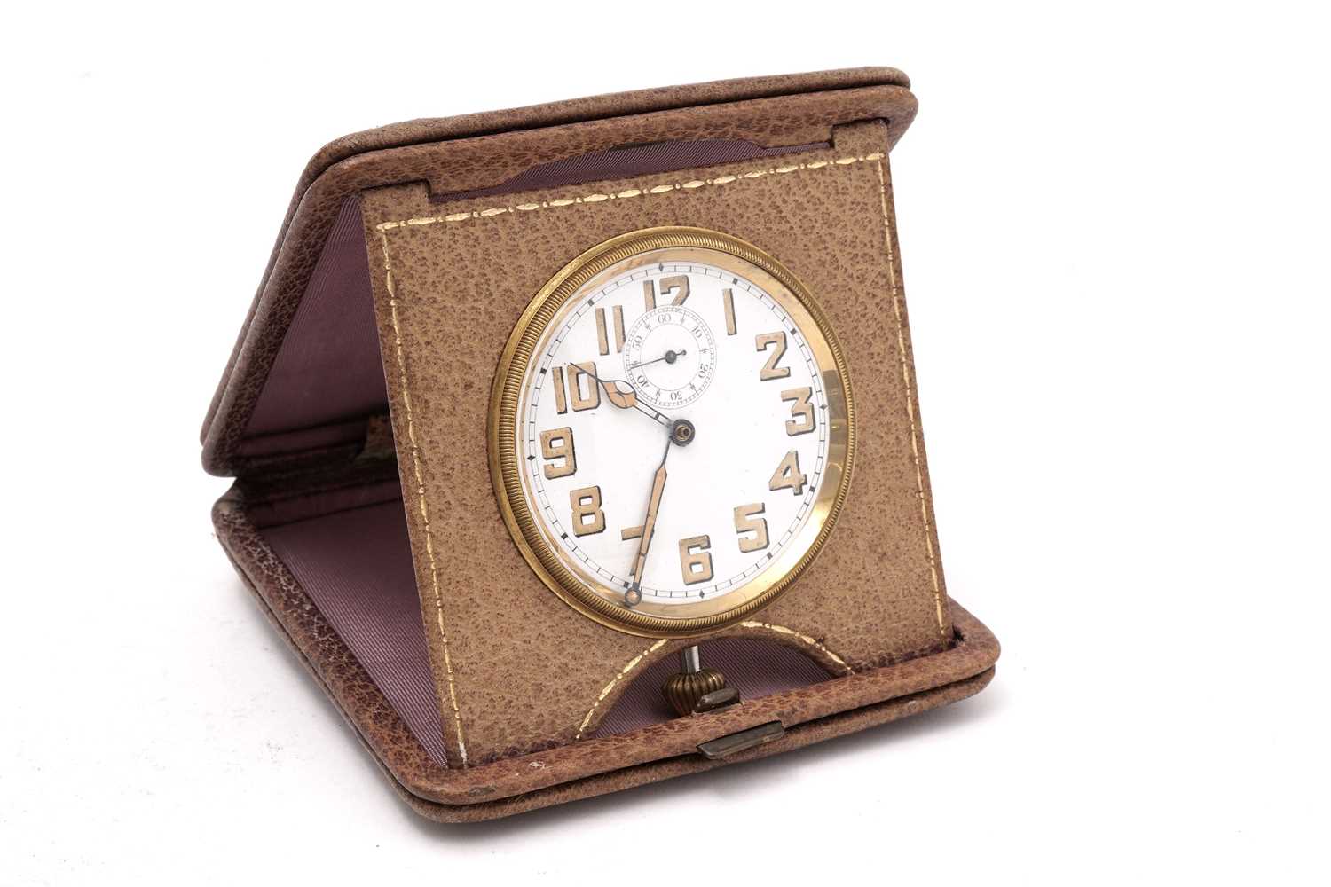 Lot 407 - An early 20th Century travel clock