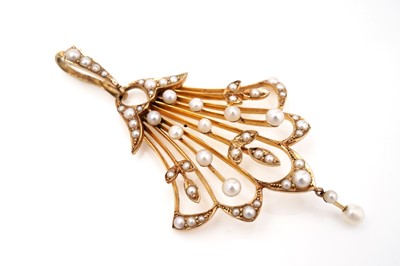 Lot 447 - An Edwardian seed pearl pendant