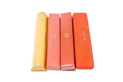 Lot 722 - Three Omega cocktail watch boxes; and one by Cyma