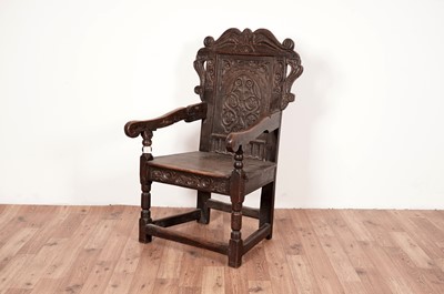 Lot 19 - A Victorian oak wainscot chair