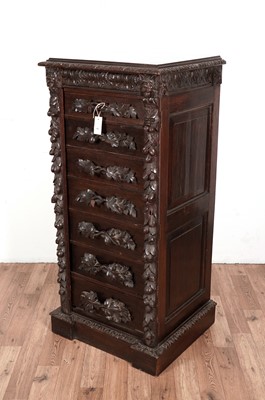 Lot 62 - A Victorian carved oak wellington chest.