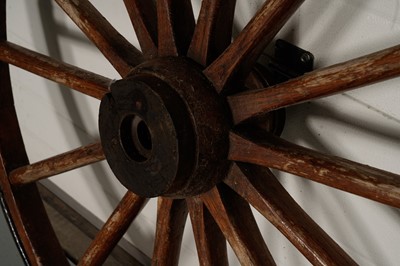 Lot 83 - Two vintage wooden cart wheels