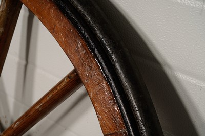Lot 83 - Two vintage wooden cart wheels