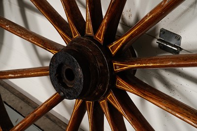 Lot 83 - Two vintage wooden cart wheels