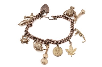 Lot 431 - A 9ct yellow gold charm bracelet