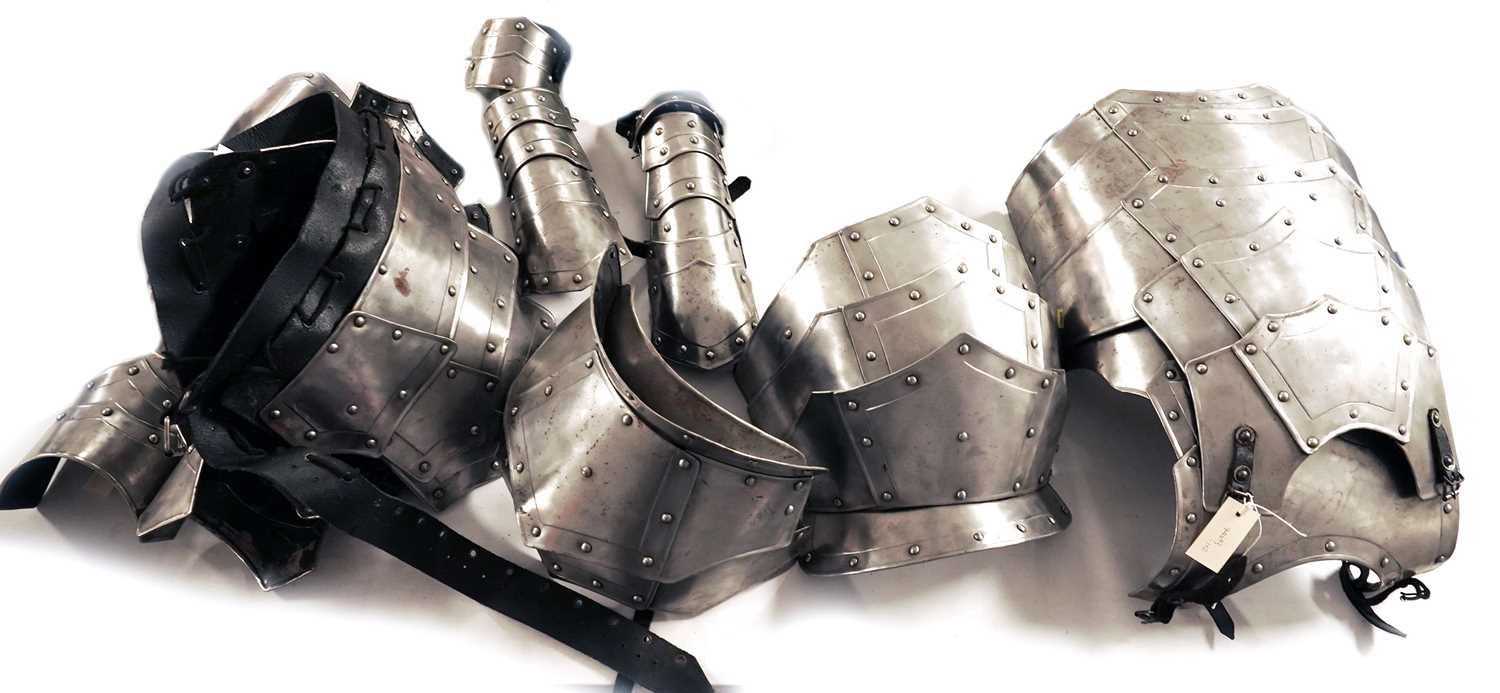 Lot 26 - An articulated and rivetted suit of armour