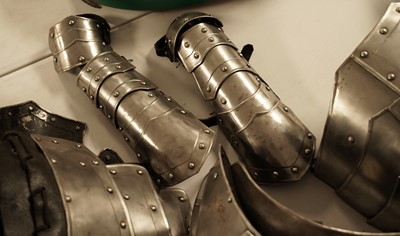 Lot 26 - An articulated and rivetted suit of armour