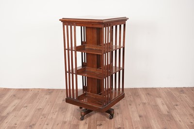 Lot 48 - A three tier walnut revolving bookcase, c1900