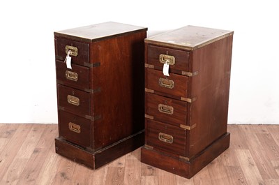 Lot 61 - A pair of mahogany and brass bound bed side chests
