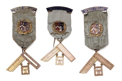 Lot 766 - Three 9ct yellow gold and enamel Masonic medals