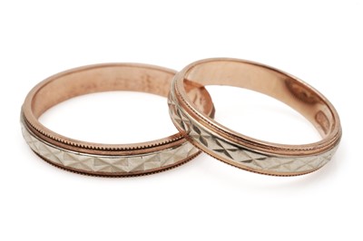 Lot 408 - A pair of 14ct gold husband and wife wedding bands