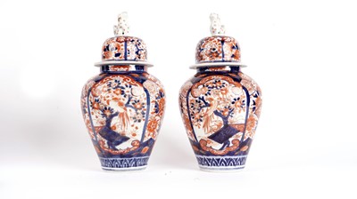 Lot 772 - Pair of Japanese Imari vases and covers