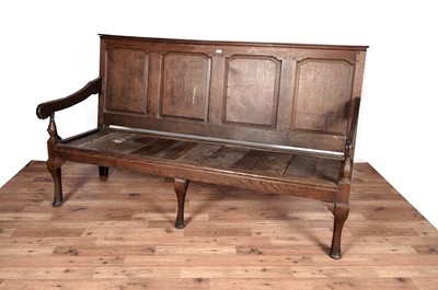 Lot 10 - A Georgian oak hall settle