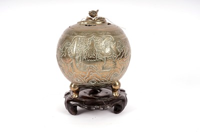 Lot 106 - A Qing Chinese bronze censor and cover