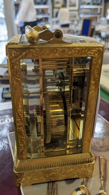 Lot 867 - Vieyres of London: A late 19th Century engraved and gilt brass carriage clock