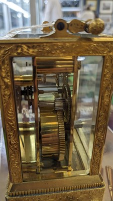 Lot 867 - Vieyres of London: A late 19th Century engraved and gilt brass carriage clock