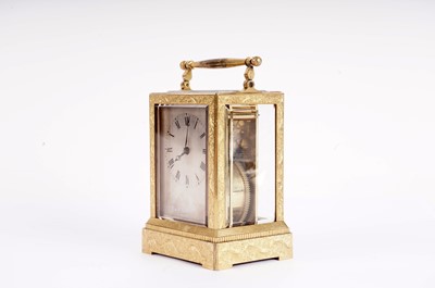Lot 867 - Vieyres of London: A late 19th Century engraved and gilt brass carriage clock