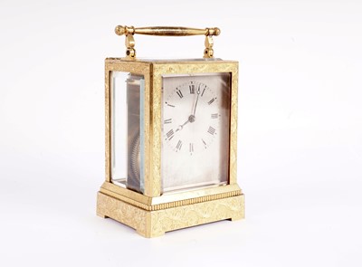 Lot 867 - Vieyres of London: A late 19th Century engraved and gilt brass carriage clock