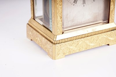 Lot 867 - Vieyres of London: A late 19th Century engraved and gilt brass carriage clock