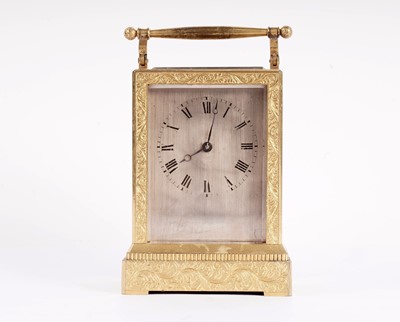 Lot 867 - Vieyres of London: A late 19th Century engraved and gilt brass carriage clock