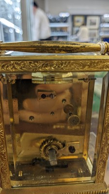 Lot 867 - Vieyres of London: A late 19th Century engraved and gilt brass carriage clock
