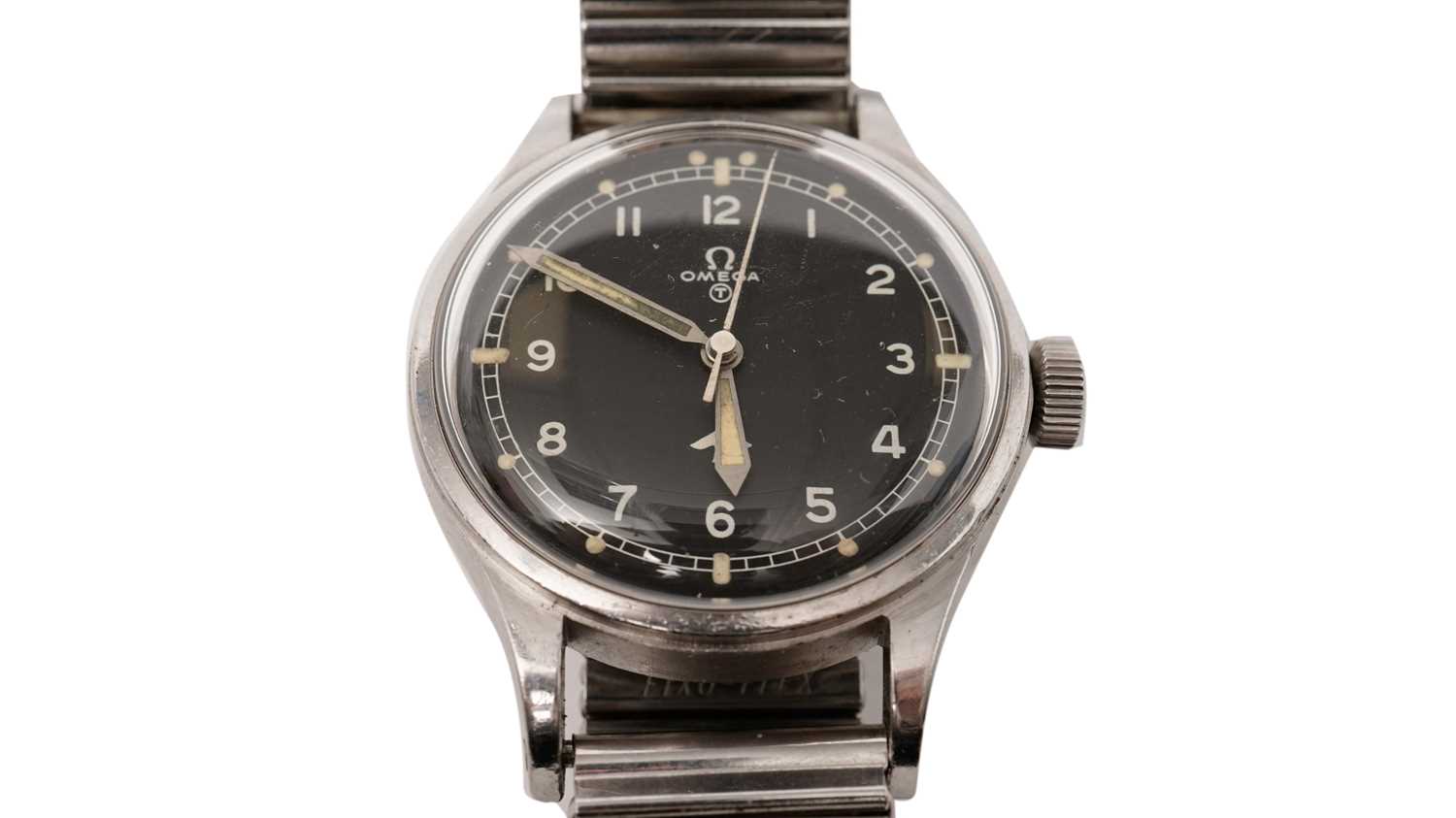 Lot 1018 - Omega British Military: A stainless steel cased manual wind wristwatch and medals