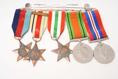 Lot 1018 - Omega British Military: A stainless steel cased manual wind wristwatch and medals