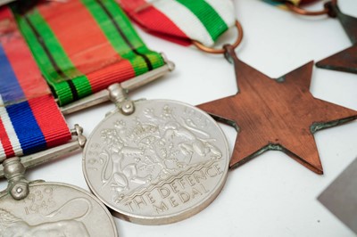 Lot 1018 - Omega British Military: A stainless steel cased manual wind wristwatch and medals