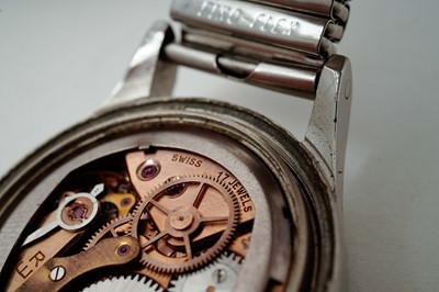 Lot 1018 - Omega British Military: A stainless steel cased manual wind wristwatch and medals