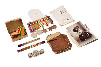 Lot 1018 - Omega British Military: A stainless steel cased manual wind wristwatch and medals