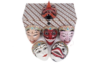 Lot 178 - A collection of vintage hand painted Indonesian Barong masks
