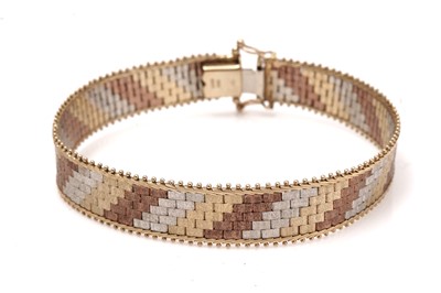 Lot 532 - A 9ct yellow, white and rose gold bracelet