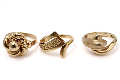 Lot 545 - Three 18ct yellow gold modern design rings