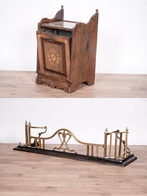 Lot 127 - An Arts & Crafts brass and cast-iron fire fender; and an Edwardian inlaid walnut coal scuttle
