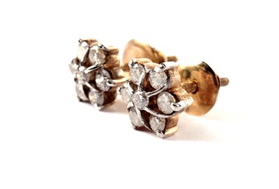 Lot 1136 - A demi-parure of diamond cluster jewellery