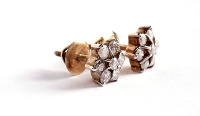 Lot 1136 - A demi-parure of diamond cluster jewellery