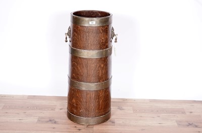 Lot 100 - An early 20th Century coopered oak and brass bound stick stand